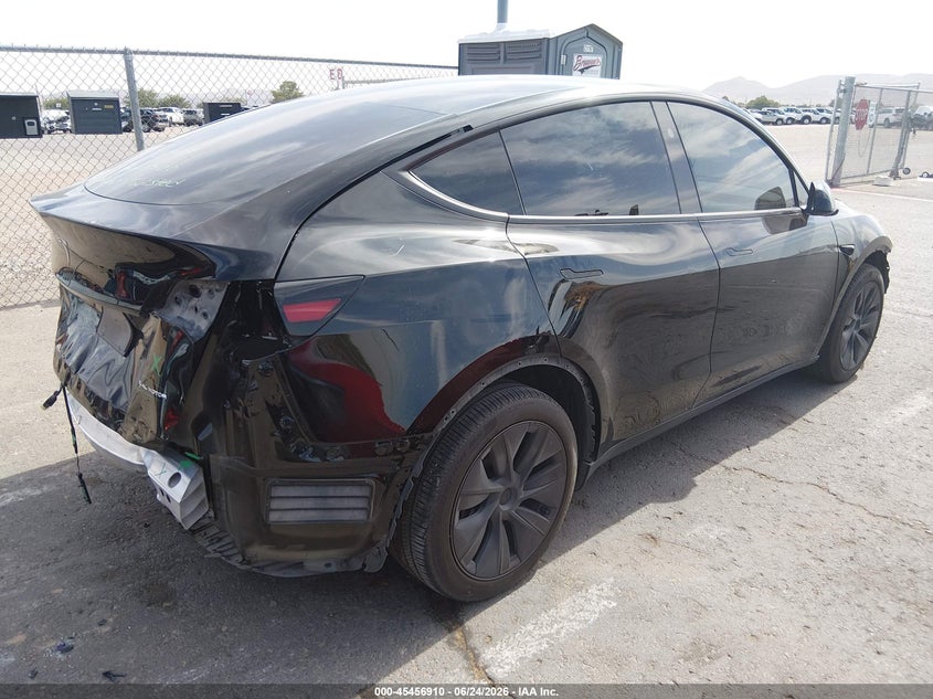 2024 Tesla Model y VIN 7SAYGDEEXRA317339 IAAI salvage auction — FRONT & REAR, Salvage Title, sold $13,700 on 2026-08-19 (photo 4)