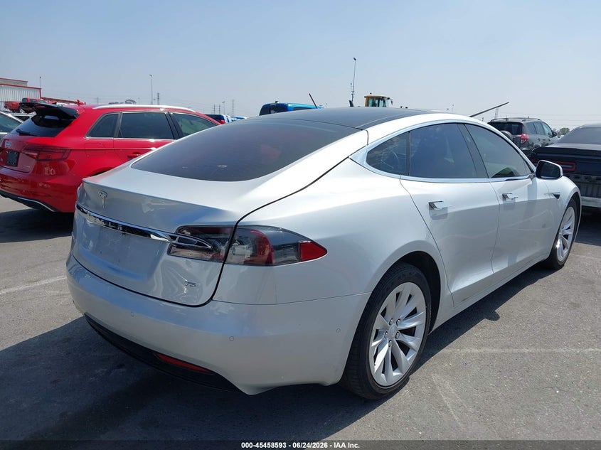 2017 Tesla Model s VIN 5YJSA1E11HF199571 IAAI salvage auction — LEFT REAR, Salvage (California), sold $7,500 on 2026-09-04 (photo 4)