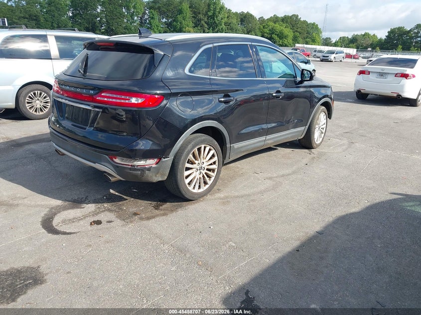 2019 Lincoln Mkc VIN 5LMCJ1D98KUL07008 IAAI salvage auction — SIDE, Clear (Alabama), sold $2,900 on 2026-07-17 (photo 4)