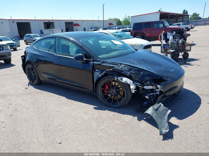 2025 Tesla Model 3 VIN 5YJ3E1ET2SF077433 — IAAI salvage auction photo