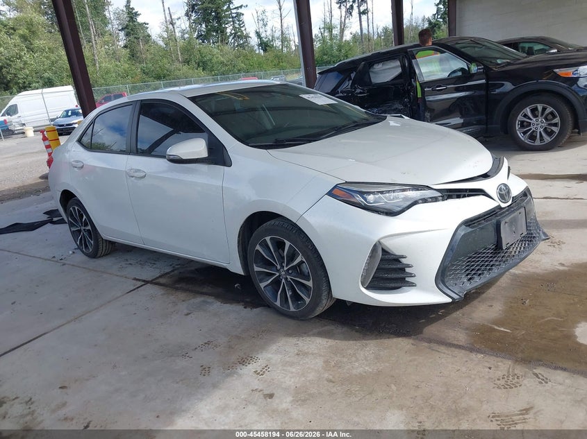 2018 Toyota Corolla VIN 5YFBURHE0JP802816 IAAI salvage auction — LEFT FRONT, Salvage Title, sold $5,450 on 2026-07-29 (photo 1)