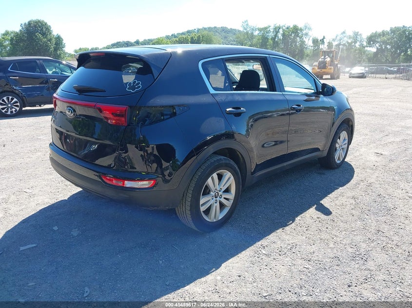 2019 Kia Sportage VIN KNDPMCAC8K7574711 IAAI salvage auction — SIDE, Salvage (Ohio), sold $3,900 on 2026-07-20 (photo 4)