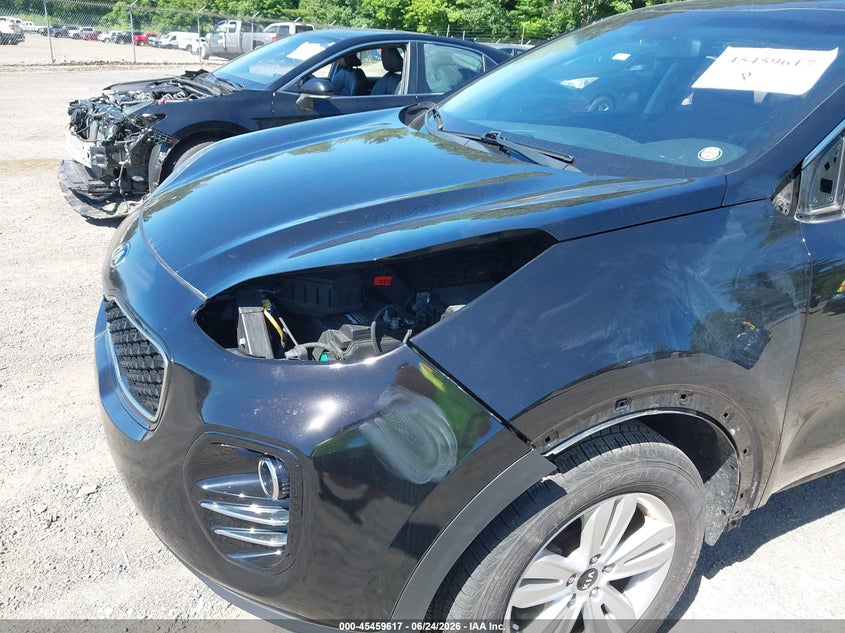 2019 Kia Sportage VIN KNDPMCAC8K7574711 IAAI salvage auction — SIDE, Salvage (Ohio), sold $3,900 on 2026-07-20 (photo 6)