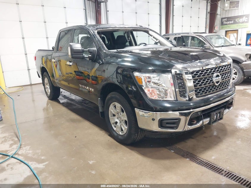 2018 Nissan TITAN VIN 1N6AA1E55JN511815 IAAI salvage auction — STORM DAMAGE, Salvage (North Dakota), sold $7,050 on 2026-07-30 (photo 1)