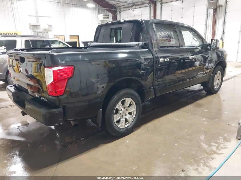 2018 Nissan TITAN VIN 1N6AA1E55JN511815 IAAI salvage auction — STORM DAMAGE, Salvage (North Dakota), sold $7,050 on 2026-07-30 (photo 4)
