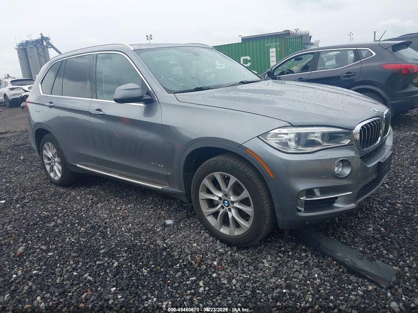 2014 BMW X5 VIN 5UXKR0C50E0K43724 IAAI salvage auction — LEFT SIDE, Salvage (Arizona), sold $4,200 on 2026-07-14 (photo 1)