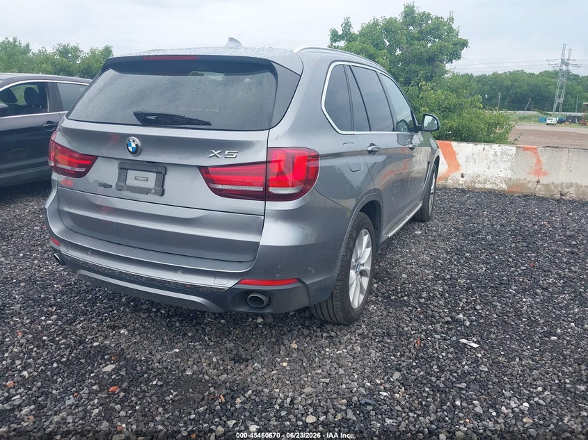 2014 BMW X5 VIN 5UXKR0C50E0K43724 IAAI salvage auction — LEFT SIDE, Salvage (Arizona), sold $4,200 on 2026-07-14 (photo 4)