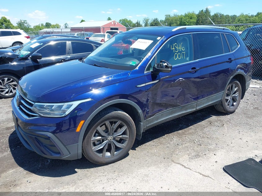 2023 Volkswagen Tiguan VIN 3VV3B7AX4PM082772 IAAI salvage auction — SIDE, Salvage Title, sold $6,600 on 2026-08-06 (photo 2)