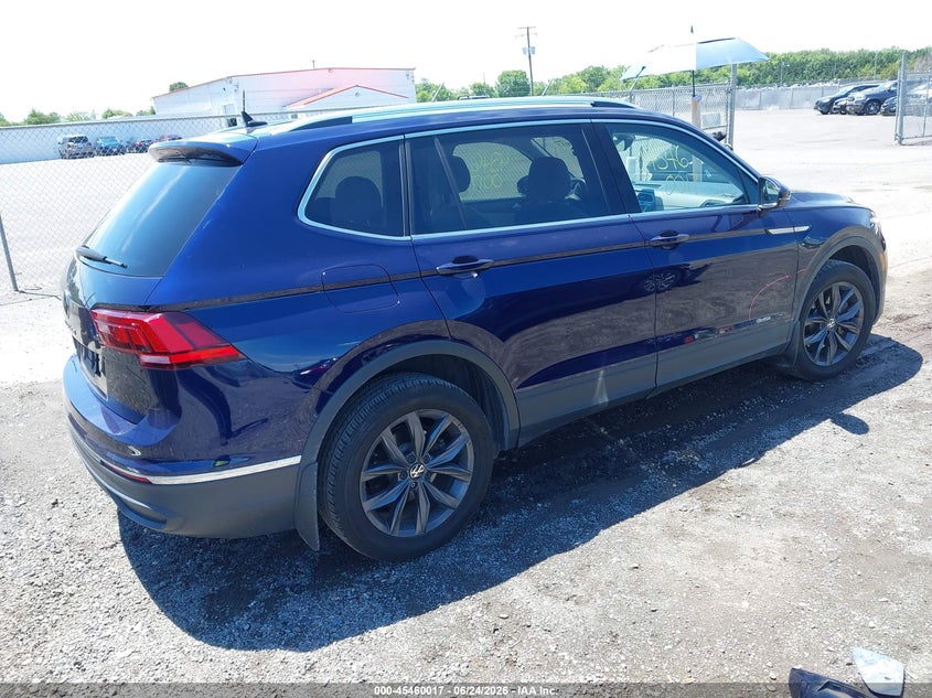2023 Volkswagen Tiguan VIN 3VV3B7AX4PM082772 IAAI salvage auction — SIDE, Salvage Title, sold $6,600 on 2026-08-06 (photo 4)