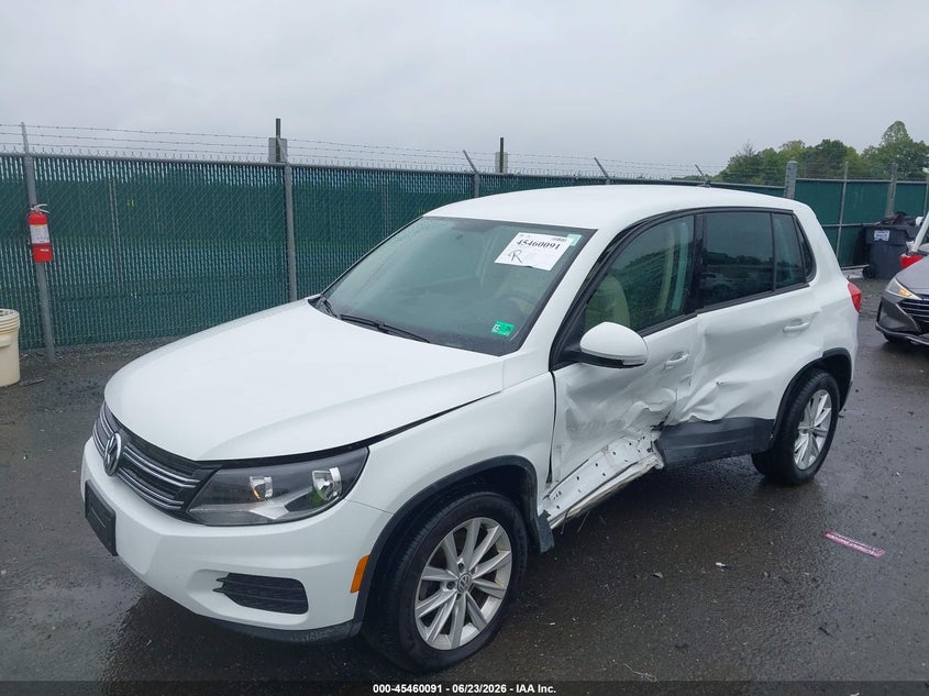 2014 Volkswagen Tiguan VIN WVGAV3AX9EW621286 IAAI salvage auction — SIDE, Salvage Title, sold $1,700 on 2026-08-10 (photo 2)