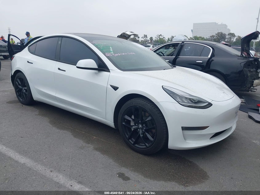 2018 Tesla Model 3 VIN 5YJ3E1EA4JF062560 IAAI salvage auction — LEFT REAR, Wait Title, sold $6,700 on 2026-08-31 (photo 1)