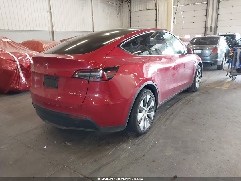 2023 Tesla Model y VIN 7SAYGDEE7PF798294 IAAI salvage auction — LEFT SIDE, Salvage (Oregon), sold $10,800 on 2026-08-28 (photo 4)