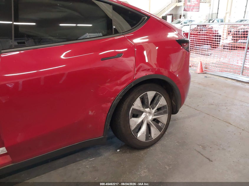 2023 Tesla Model y VIN 7SAYGDEE7PF798294 IAAI salvage auction — LEFT SIDE, Salvage (Oregon), sold $10,800 on 2026-08-28 (photo 6)