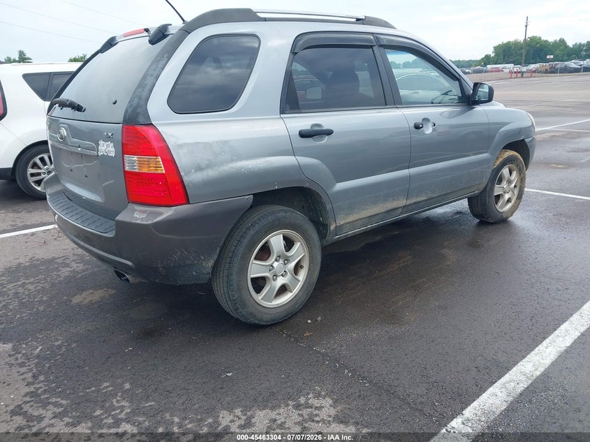 2007 Kia Sportage VIN KNDJF724277332406 IAAI salvage auction — NORMAL WEAR, Clear (Tennessee), sold $200 on 2026-07-21 (photo 4)