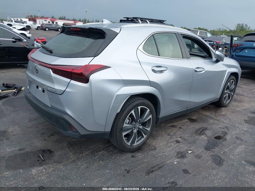 2023 Lexus Ux VIN JTHP6JBH7P2141957 IAAI salvage auction — WATER/FLOOD, Salvage Title, sold $11,100 on 2026-07-23 (photo 4)