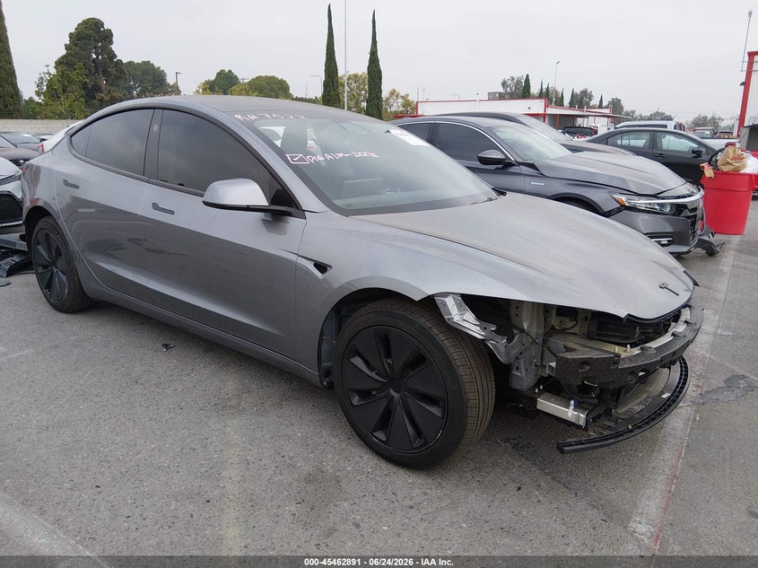 2025 Tesla Model 3 VIN 5YJ3E1EA4SF021430 — IAAI salvage auction photo
