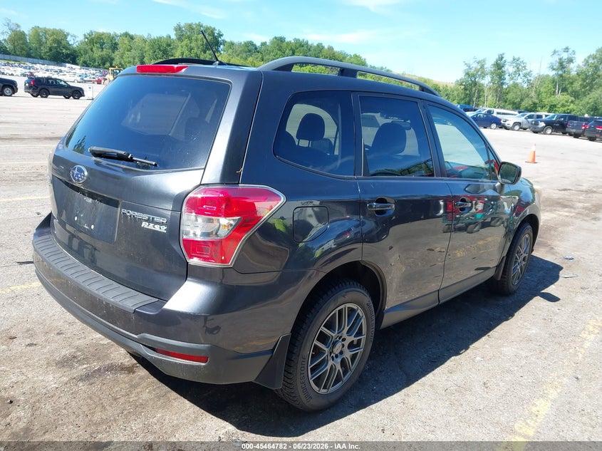 2014 Subaru Forester VIN JF2SJAECXEH429770 IAAI salvage auction — NORMAL WEAR, Clear (Michigan), sold $650 on 2026-07-27 (photo 4)