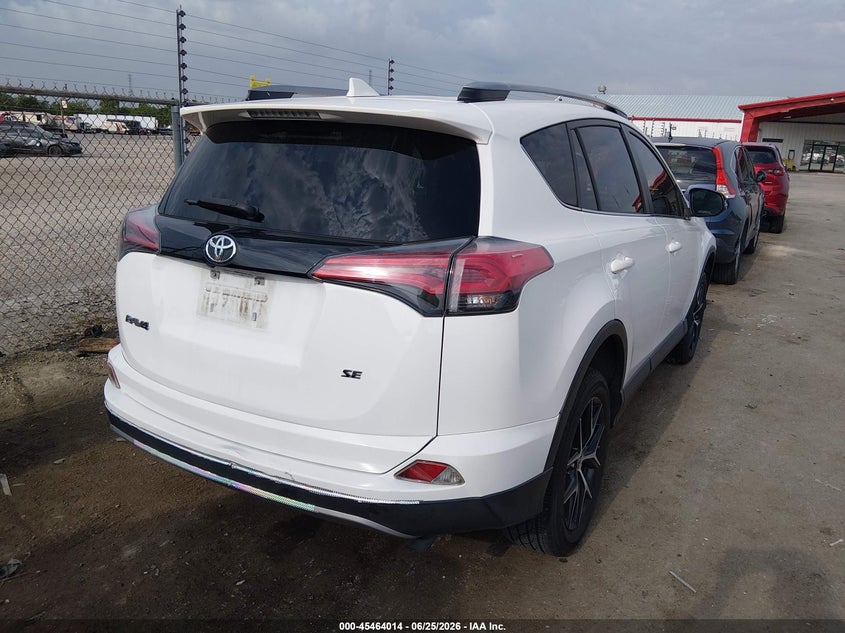 2018 Toyota Rav 4 VIN JTMNFREV8JJ746561 IAAI salvage auction — WATER/FLOOD, Salvage Title, sold $6,100 on 2026-07-29 (photo 4)