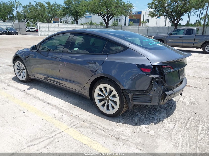2023 Tesla Model 3 VIN 5YJ3E1EA4PF666165 IAAI salvage auction — REAR END, Rebuildable (Florida), sold $8,600 on 2026-07-16 (photo 3)