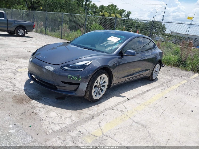 2023 Tesla Model 3 VIN 5YJ3E1EA4PF666165 IAAI salvage auction — REAR END, Rebuildable (Florida), sold $8,600 on 2026-07-16 (photo 2)