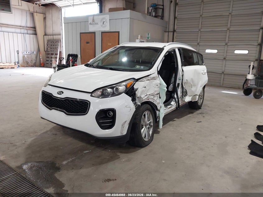 2017 Kia Sportage VIN KNDPMCAC6H7035545 IAAI salvage auction — SIDE, Salvage Title, sold $1,125 on 2026-07-30 (photo 2)