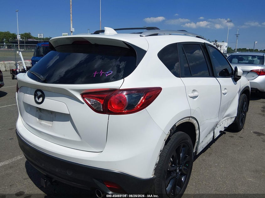2014 Mazda Cx-5 VIN JM3KE4DY2E0415109 IAAI salvage auction — SIDE, Salvage (New Jersey), sold $1,750 on 2026-07-30 (photo 4)