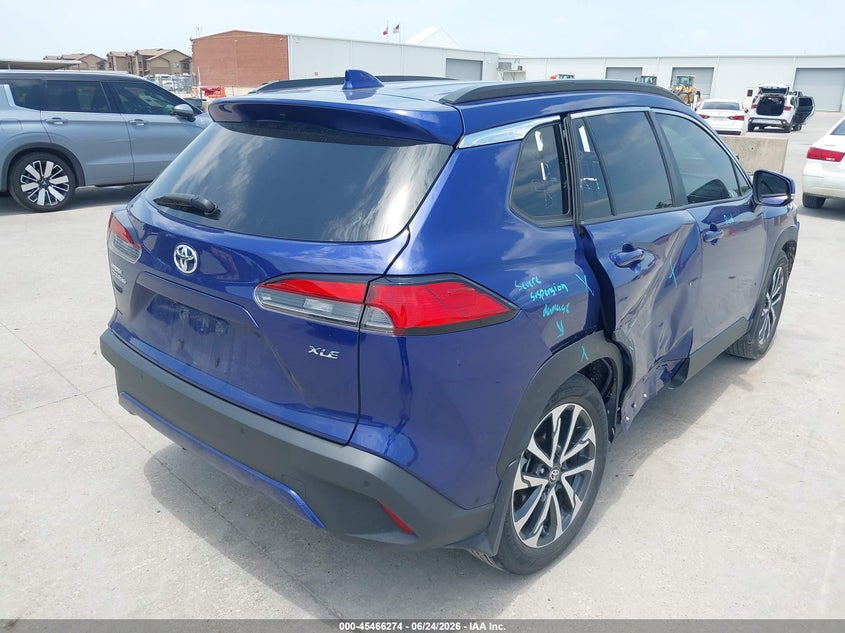 2023 Toyota Corolla cross VIN 7MUDAAAG5PV065083 IAAI salvage auction — SIDE, Original (Texas), sold $9,800 on 2026-08-02 (photo 4)