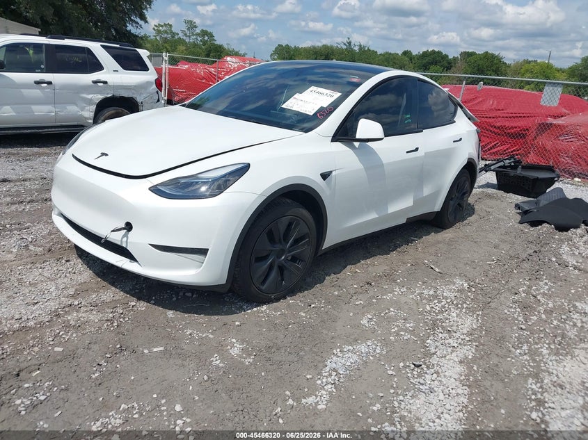 2024 Tesla Model y VIN 7SAYGDED0RA328180 IAAI salvage auction — REAR END, Rebuildable (Florida), sold $8,350 on 2026-07-23 (photo 2)