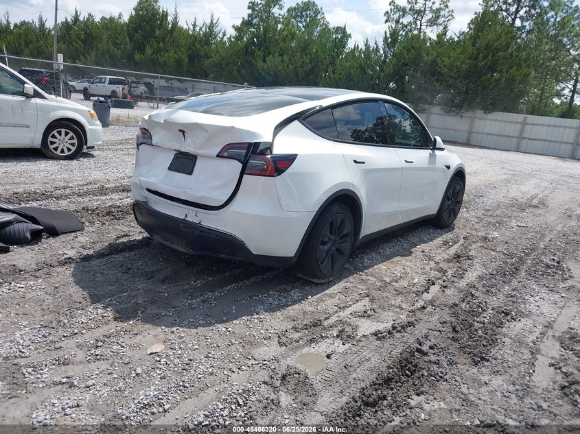 2024 Tesla Model y VIN 7SAYGDED0RA328180 IAAI salvage auction — REAR END, Rebuildable (Florida), sold $8,350 on 2026-07-23 (photo 4)