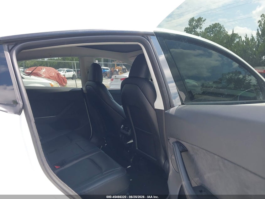 2024 Tesla Model y VIN 7SAYGDED0RA328180 IAAI salvage auction — REAR END, Rebuildable (Florida), sold $8,350 on 2026-07-23 (photo 8)