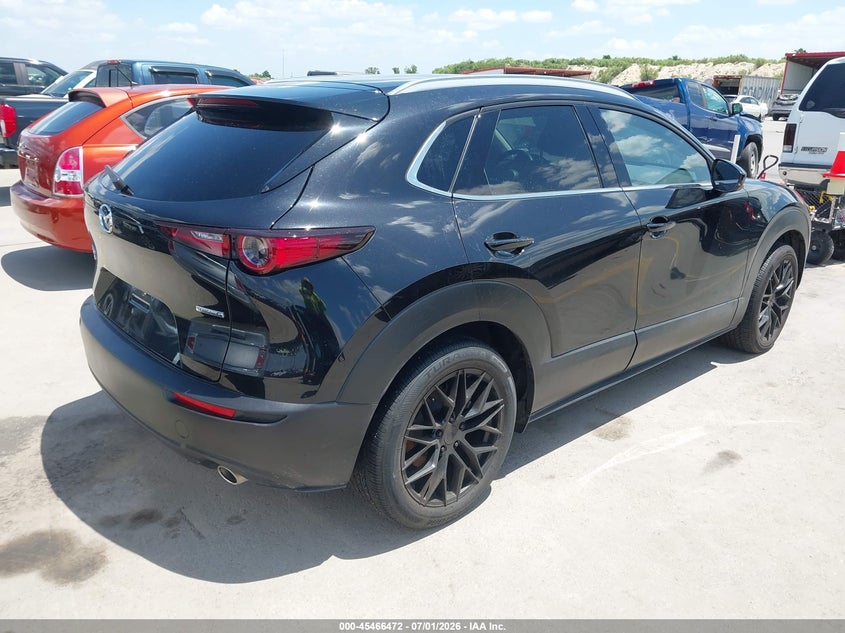 2023 Mazda Cx-30 VIN 3MVDMBDM8PM523819 IAAI salvage auction — WATER/FLOOD, Wait Title, sold $6,500 on 2026-09-02 (photo 4)