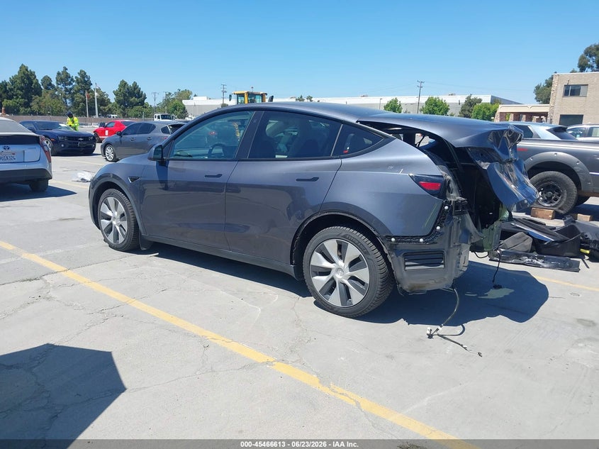 2023 Tesla Model y VIN 7SAYGDEE5PF690093 IAAI salvage auction — REAR END, Salvage (Oregon), sold $12,000 on 2026-08-23 (photo 3)