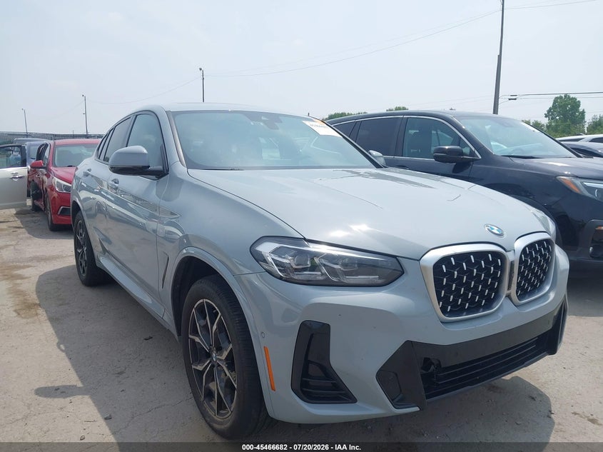 2023 BMW X4 VIN 5UX33DT09P9S11001 — IAAI salvage auction photo