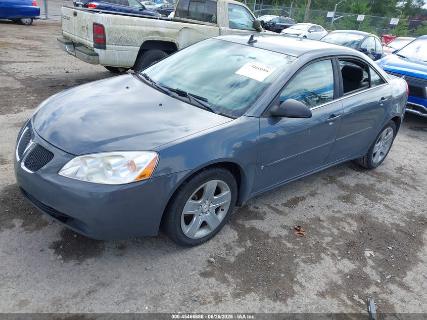 2009 Pontiac G6 VIN 1G2ZG57B394165798 IAAI salvage auction — NORMAL WEAR, Clear (Washington), sold $25 on 2026-07-08 (photo 2)