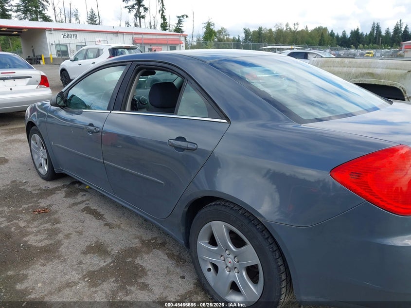 2009 Pontiac G6 VIN 1G2ZG57B394165798 IAAI salvage auction — NORMAL WEAR, Clear (Washington), sold $25 on 2026-07-08 (photo 6)