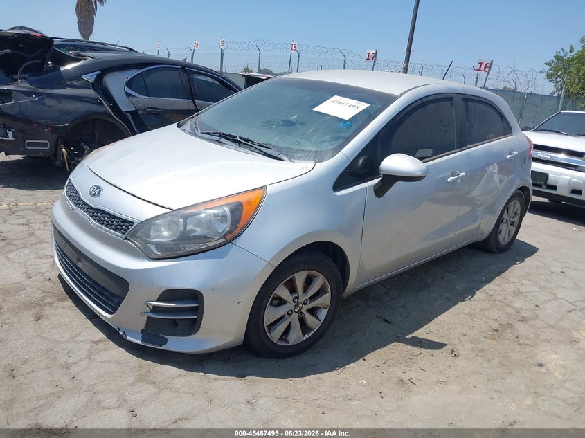 2016 Kia Rio VIN KNADN5A37G6677690 IAAI salvage auction — UNKNOWN, Salvage Title - Dealer (California), sold $800 on 2026-07-15 (photo 2)