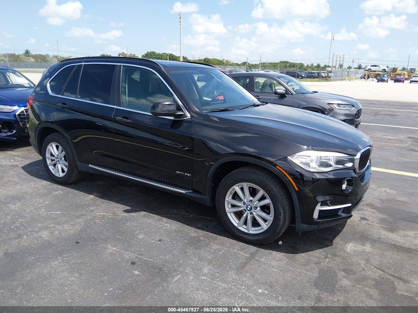 2014 BMW X5 VIN 5UXKR2C59E0H32671 IAAI salvage auction — SIDE, Salvage Title, sold $5,000 on 2026-07-23 (photo 1)