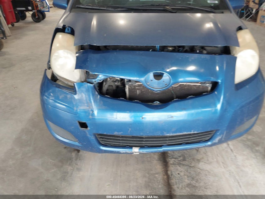 2009 Toyota Yaris VIN JTDKT903795235431 IAAI salvage auction — FRONT END, Clear (Colorado), sold $750 on 2026-07-22 (photo 6)
