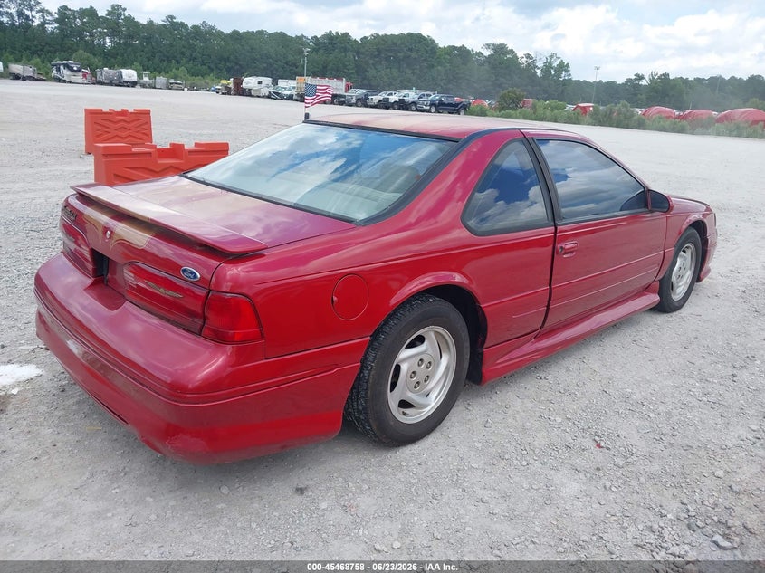 1997 Ford Thunderbird VIN 1FALP62W6VH129842 IAAI salvage auction — NORMAL WEAR, Clear (South Carolina), sold $1,425 on 2026-07-07 (photo 4)