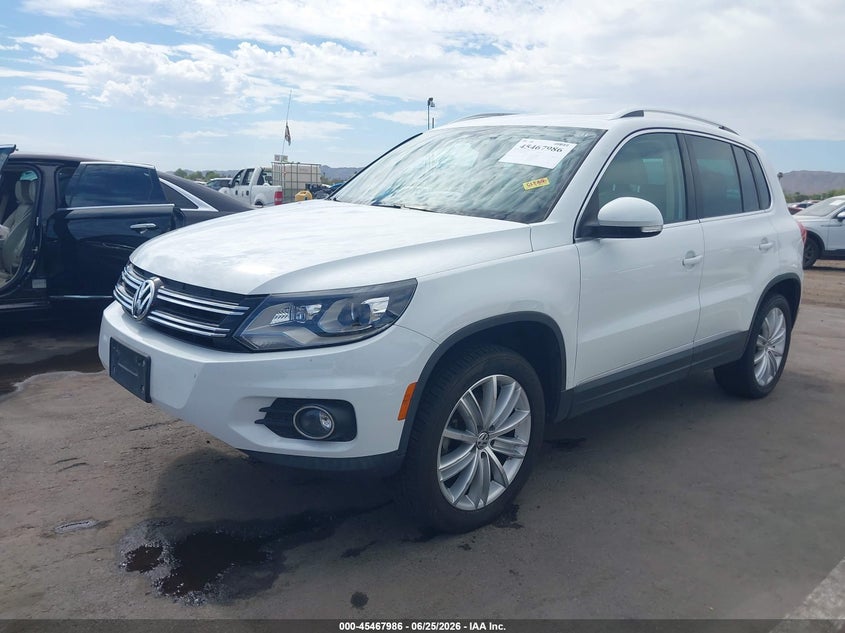 2016 Volkswagen Tiguan VIN WVGBV7AX0GW590461 IAAI salvage auction — RIGHT FRONT, Salvage (Arizona), sold $2,350 on 2026-07-10 (photo 2)