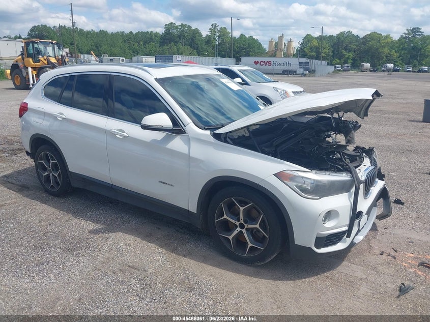 2018 BMW X1 VIN WBXHU7C3XJ5L04983 IAAI salvage auction — NORMAL WEAR, Clear (Alabama), sold $650 on 2026-07-22 (photo 1)