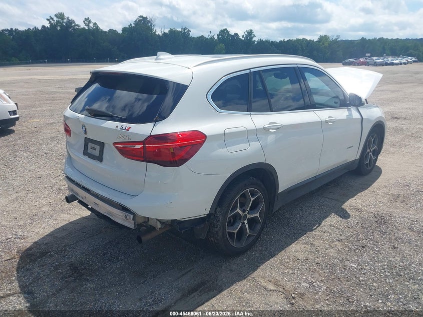 2018 BMW X1 VIN WBXHU7C3XJ5L04983 IAAI salvage auction — NORMAL WEAR, Clear (Alabama), sold $650 on 2026-07-22 (photo 4)