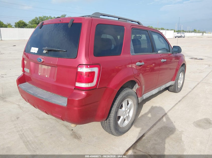 2009 Ford Escape VIN 1FMCU03G09KC97293 IAAI salvage auction — NORMAL WEAR, Original (Texas), sold $575 on 2026-07-10 (photo 4)