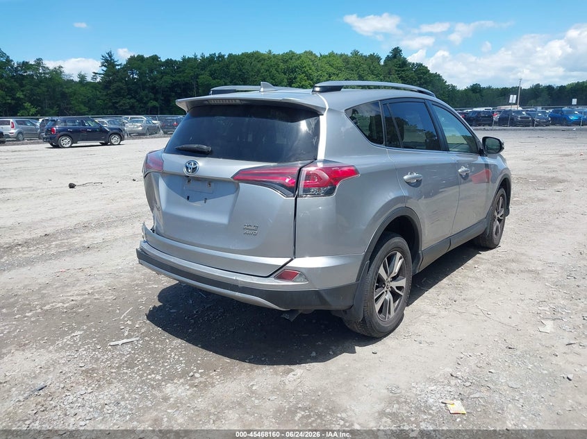 2018 Toyota Rav 4 VIN JTMRFREV9JD246957 IAAI salvage auction — REAR END, Mv-907A (New York), sold $6,300 on 2026-07-28 (photo 4)