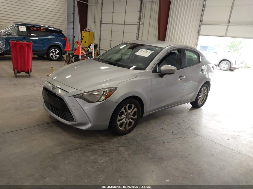 2018 Toyota Yaris VIN 3MYDLBYV9JY317949 IAAI salvage auction — SIDE, Salvage (Colorado), sold $2,500 on 2026-07-31 (photo 2)