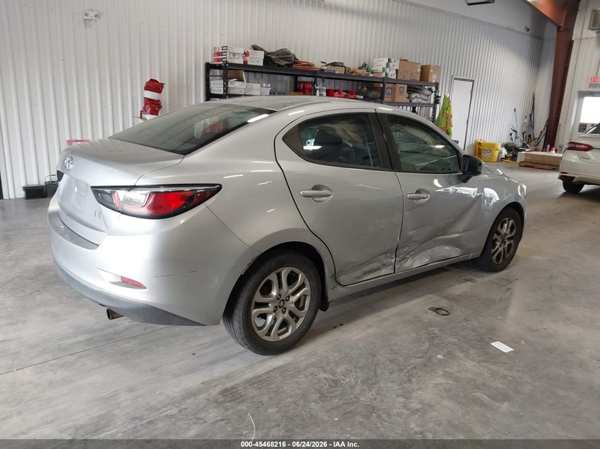 2018 Toyota Yaris VIN 3MYDLBYV9JY317949 IAAI salvage auction — SIDE, Salvage (Colorado), sold $2,500 on 2026-07-31 (photo 4)