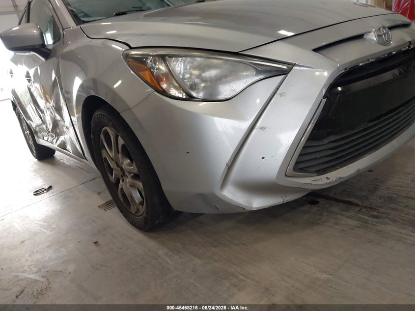 2018 Toyota Yaris VIN 3MYDLBYV9JY317949 IAAI salvage auction — SIDE, Salvage (Colorado), sold $2,500 on 2026-07-31 (photo 6)