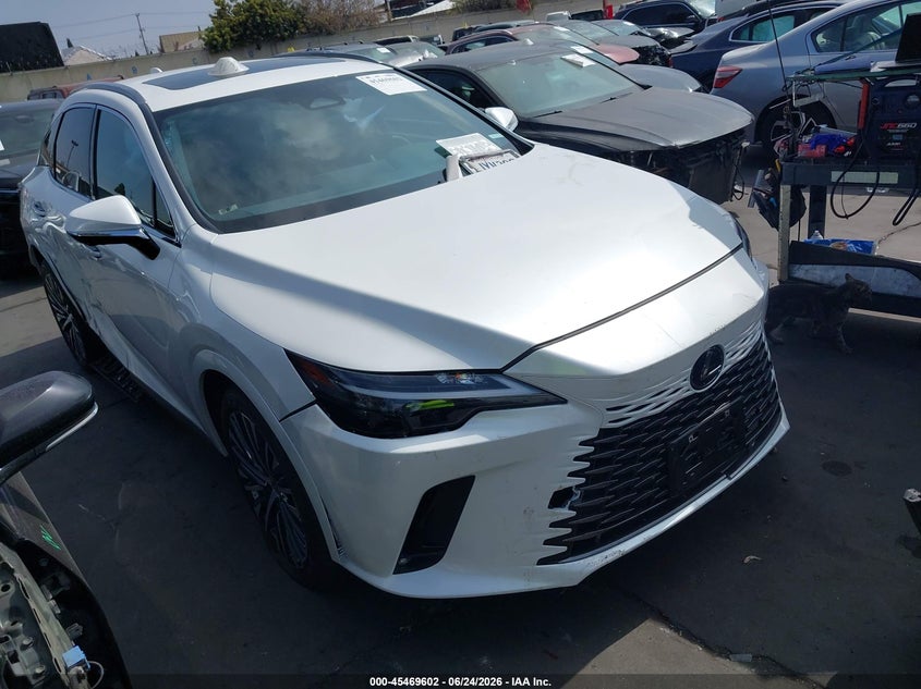 2024 Lexus Rx VIN JTJCHMAA3R2014722 IAAI salvage auction — LEFT & RIGHT, Salvage Title, sold $23,800 on 2026-07-15 (photo 1)