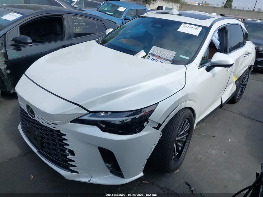 2024 Lexus Rx VIN JTJCHMAA3R2014722 IAAI salvage auction — LEFT & RIGHT, Salvage Title, sold $23,800 on 2026-07-15 (photo 2)