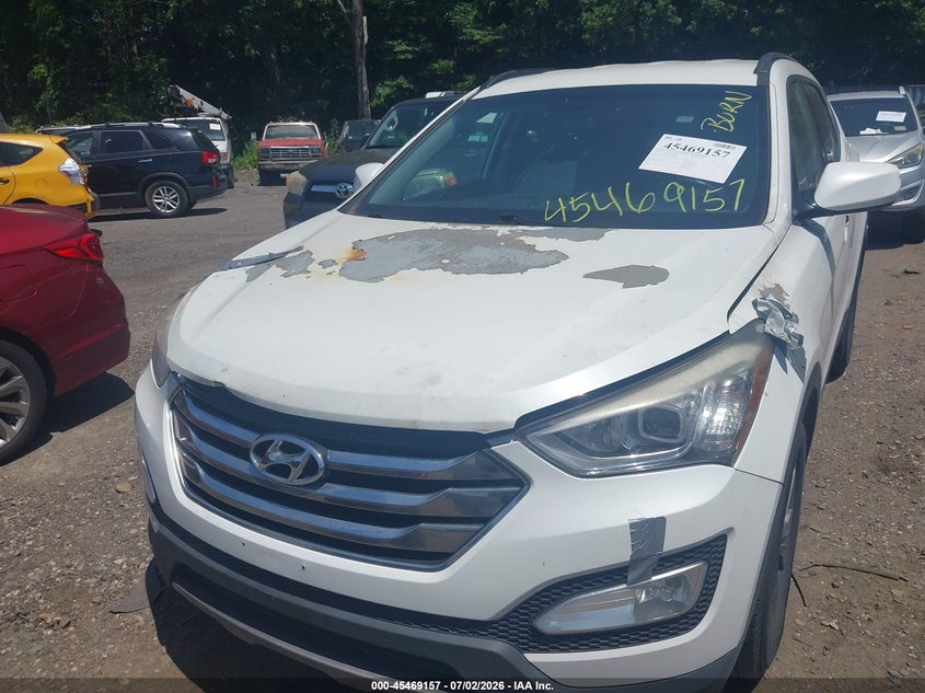 2013 Hyundai Santa fe VIN 5XYZUDLB1DG017275 IAAI salvage auction — ENGINE BURN, Mv-907A (New York), sold $525 on 2026-07-28 (photo 6)